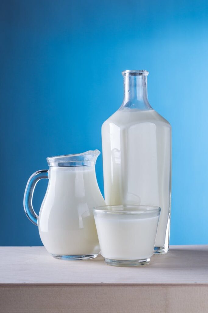 pexels-photo-248412-248412 Minimalist still life of fresh milk in glassware against a blue background.